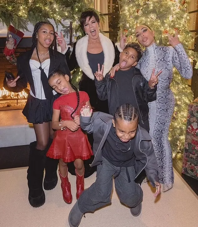 Kim Kardashian Stuns in Snakeskin Bodysuit While Celebrating Christmas Eve with Daughter Chicago