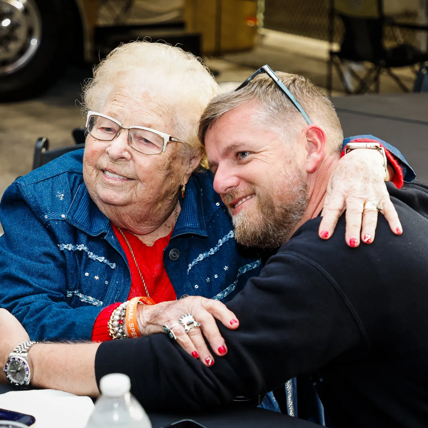 Justin Allgaier making memories with two little fan girls—future racers in the making