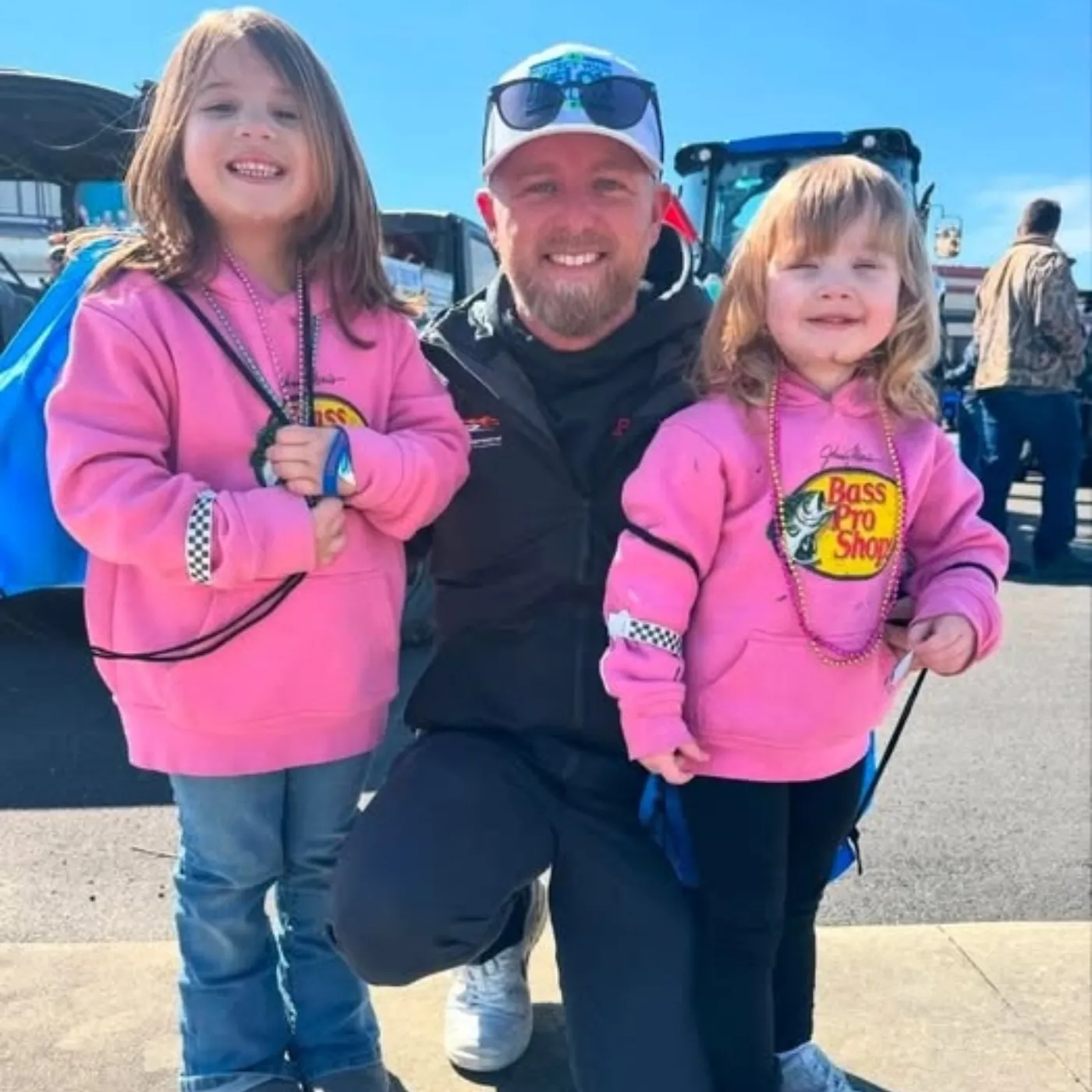 Justin Allgaier making memories with two little fan girls—future racers in the making