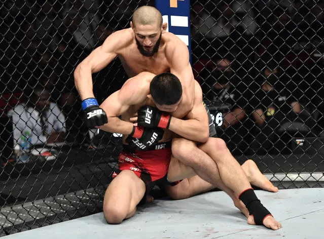 UFC 267: Khamzat Chimaev submits Li Jingliang in flawless win - Yahoo Sports