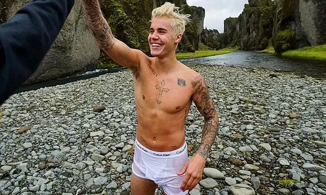 Justin Bieber dons just wet Calvin Kleins after jumping into a glacial lake  in Iceland | Daily Mail Online