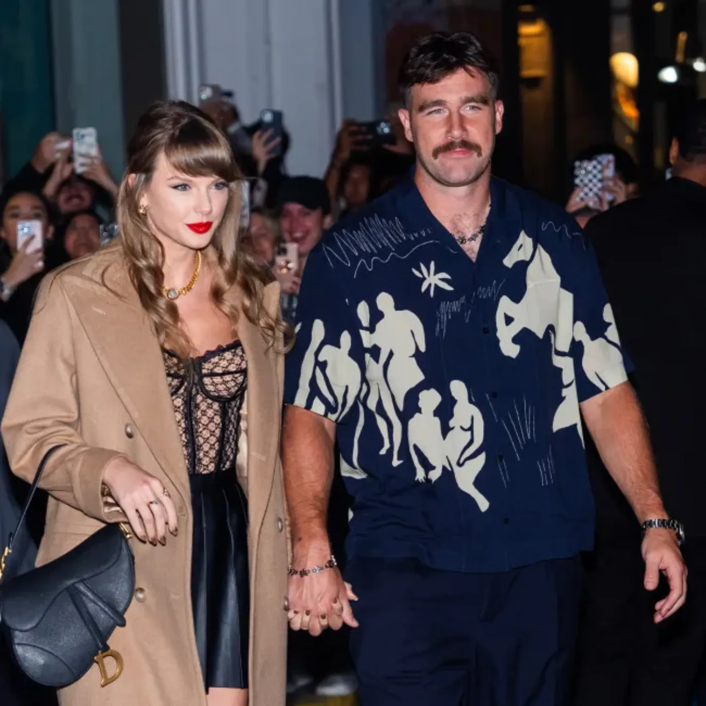 How Taylor & Travis Kept Their Romance Private for One Special Night!