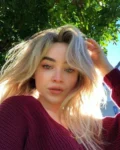 Sabrina Carpenter Shocks Fans with Mysterious Bare-Face Reveal