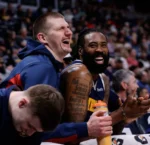 The uncontainable expression of Nikola Jokić when receiving the question "Is that the ugliest person you ever kissed in your life?"