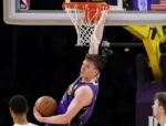 Why are NBA fans going crazy over Dalton Knecht's smooth dunks and the Lakers' determination in big games this season?