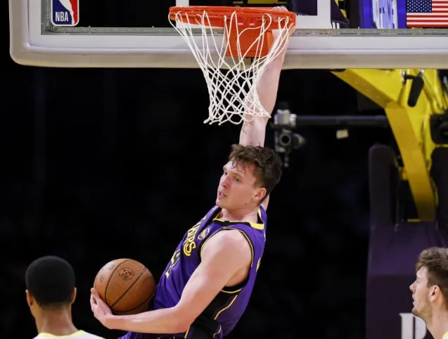 Why are NBA fans going crazy over Dalton Knecht's smooth dunks and the Lakers' determination in big games this season?