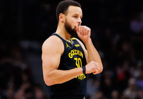 The pain in the Warriors' locker room: Steve Kerr's silent hug speaks volumes as Stephen Curry struggles with injury