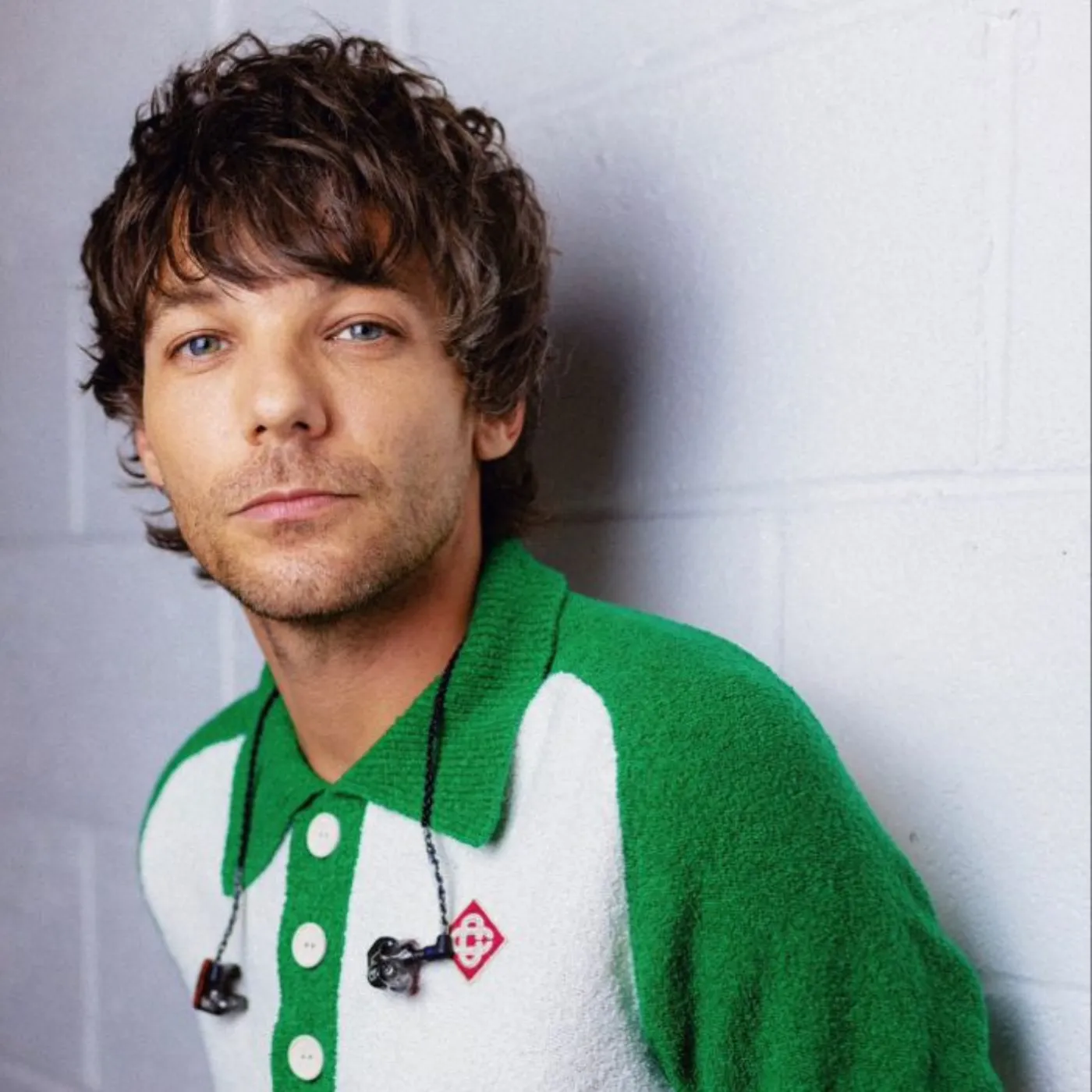 image_682a06ddbd388 Louis Tomlinson’s Viral Reaction to a Fan’s Tattoo Is Setting the Internet on Fire