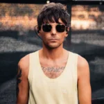 Louis Tomlinson’s Viral Reaction to a Fan’s Tattoo Is Setting the Internet on Fire 1 Louis Tomlinson’s Viral Reaction to a Fan’s Tattoo Is Setting the Internet on Fire