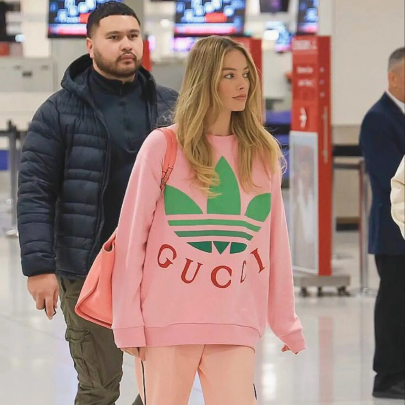 image_682af39557ef0 Margot Robbie’s Airport Look Is Setting Fashion Goals Everywhere