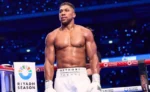 Anthony Joshua Faces Setback: Return to Boxing Ring Delayed Due to Elbow Surgery