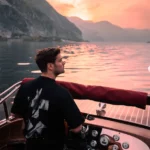 Martin Garrix sails his own boat at sunset on Lake Como – Could this be his way of 'resetting' his soul after the wild music nights?