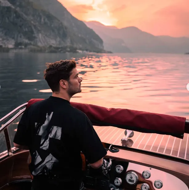 Martin Garrix sails his own boat at sunset on Lake Como – Could this be his way of 'resetting' his soul after the wild music nights?