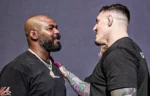 Jones Mocks Aspinall: 'Not as Special as Fans Think, Tapped Out Twice!' 1 Jones Mocks Aspinall: 'Not as Special as Fans Think, Tapped Out Twice!'