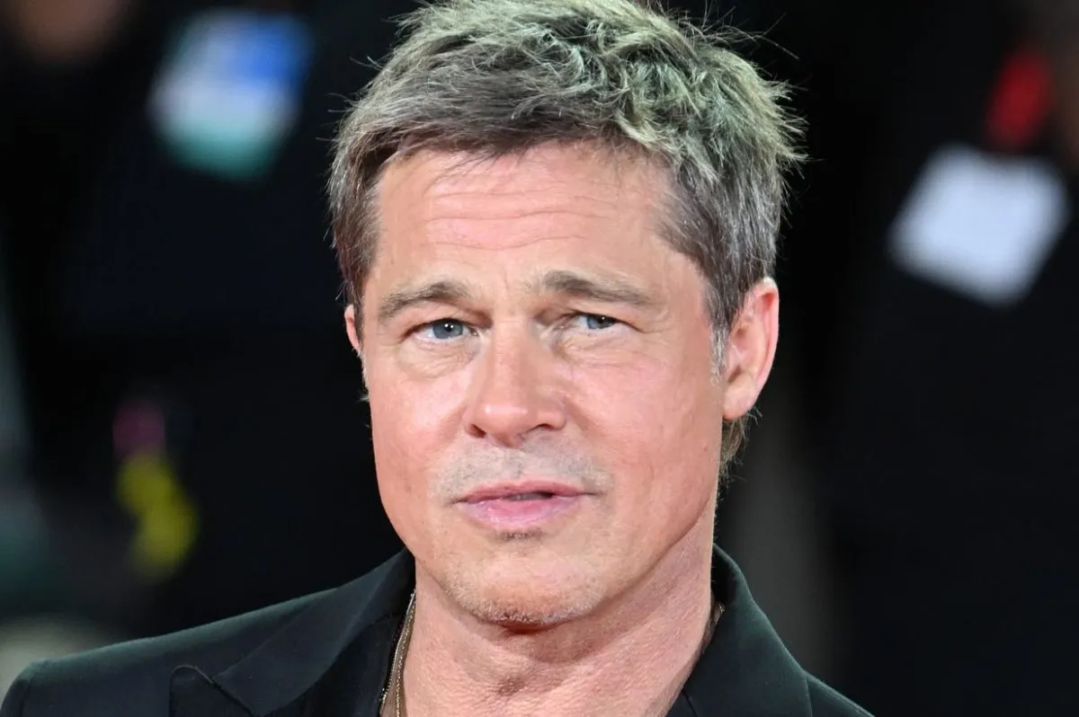 image_6847919b08d3f Caught in the middle of the night with a stranger, what is Brad Pitt hiding?