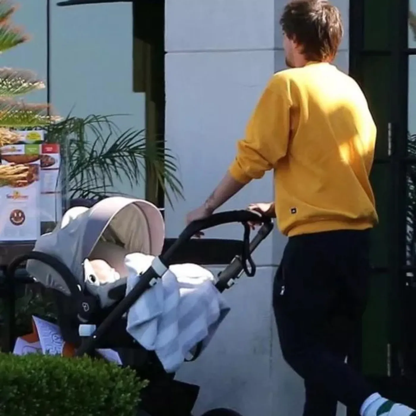 No Screen Time. No Celeb Privilege. This Is How Louis Tomlinson Raises His Child