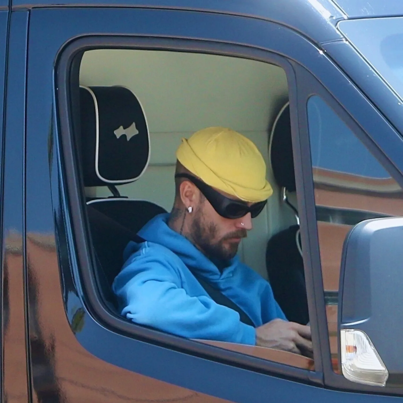 Justin Bieber Emerges Solo from Steamy Russian Bathhouse as Hailey Bieber Grinds on Work