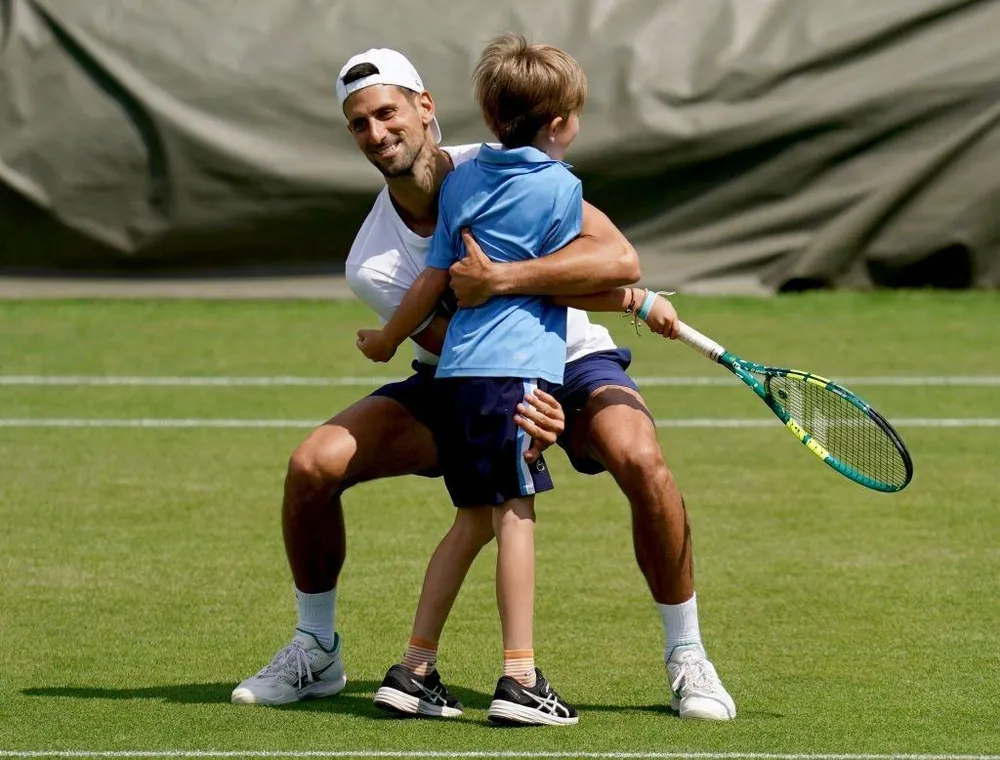 image_6875fcf68e9c2 Crowd Gasps as Novak Djokovic Drops His Racket Mid-Match to Hug Son After Shocking Gesture — What Happened Moments Before Will Melt Your Heart