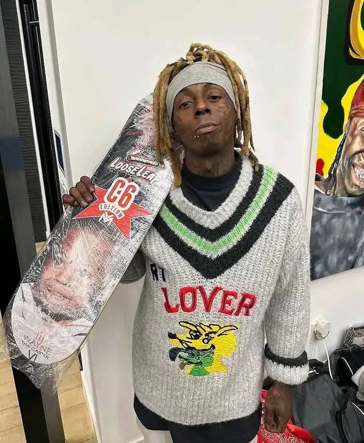 Lil Wayne Holding a Skateboard Etched with 'C6' — Is Tha Carter VI About to Explode?