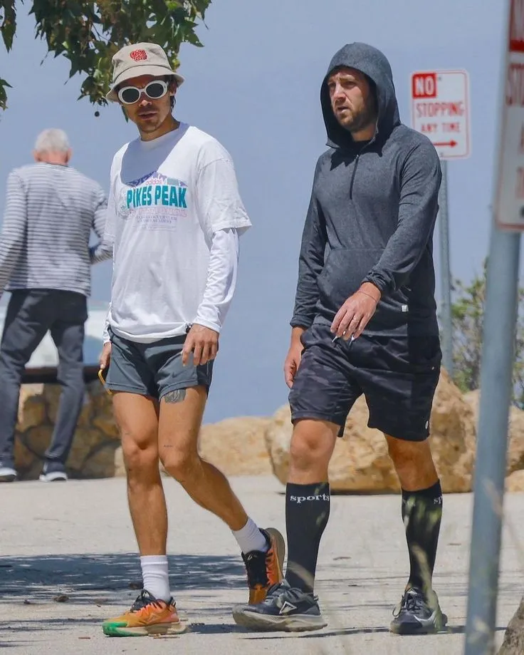 image_689a9d70719ee What Is Harry Styles Doing in This Tiny Irish Town — And Who’s the Mystery Man by His Side?