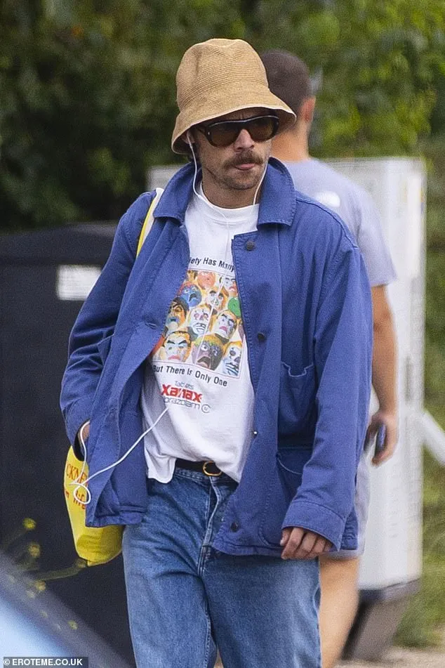 image_68a0123cd7e68 Harry Styles takes a peaceful stroll in London — but his Xanax t-shirt has fans asking: What message is he trying to send?