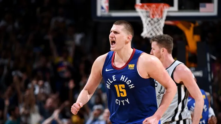 image_68a3eac960358 Unleashing the Unexpected: Nikola Jokic Dazzles with a Stunning 2-Handed Reverse Slam