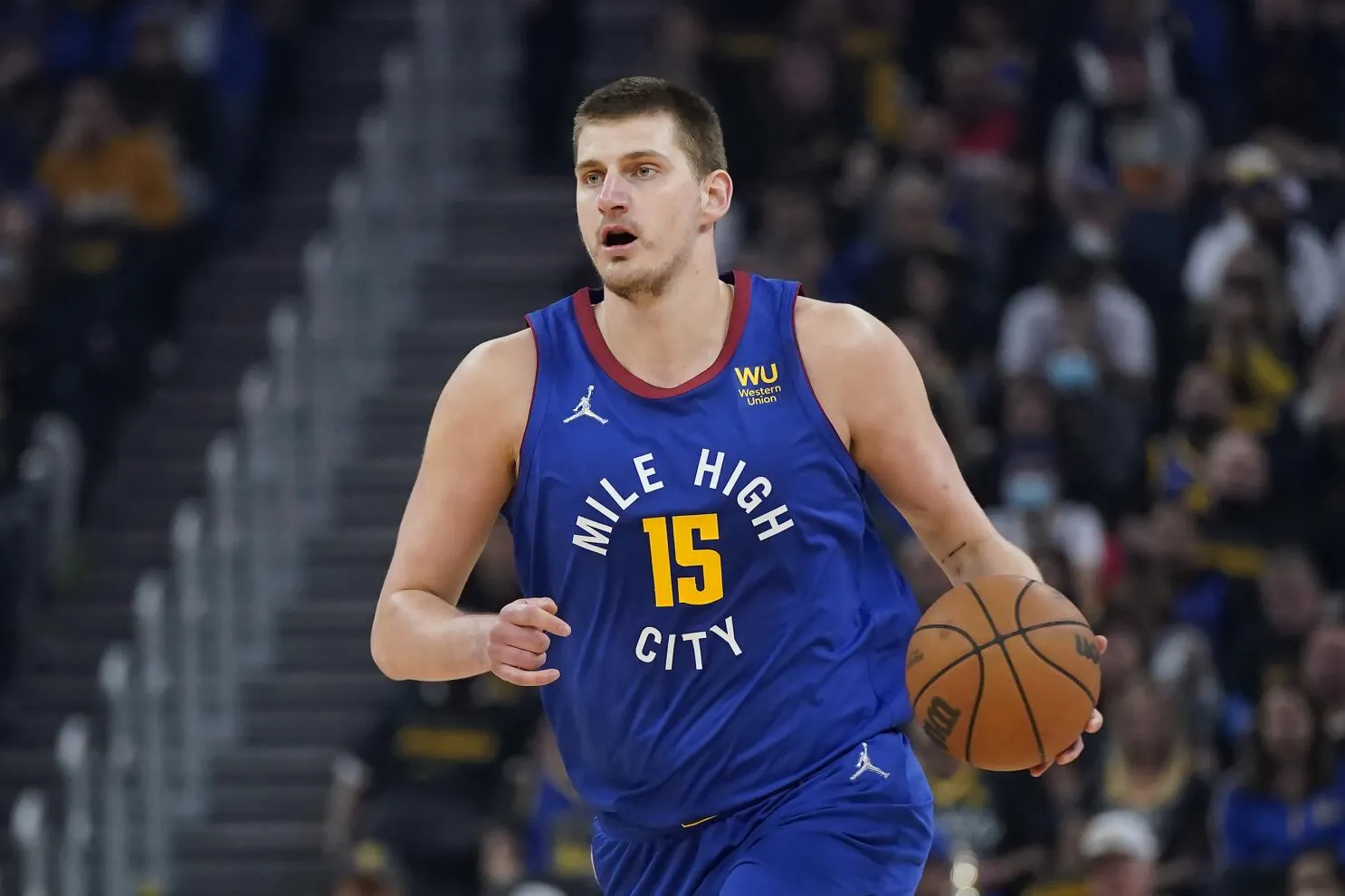 Unleashing the Unexpected: Nikola Jokic Dazzles with a Stunning 2-Handed Reverse Slam