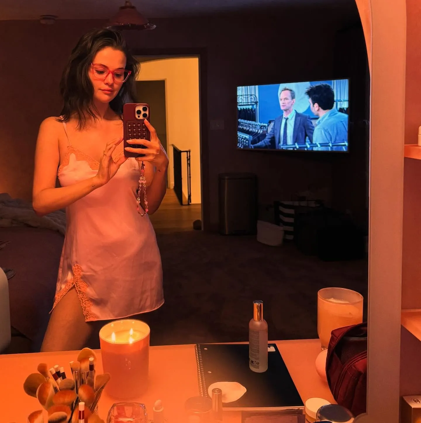 image_68a416c716552 Selena Gomez Turns Heads in a Daring Pink Slip Dress