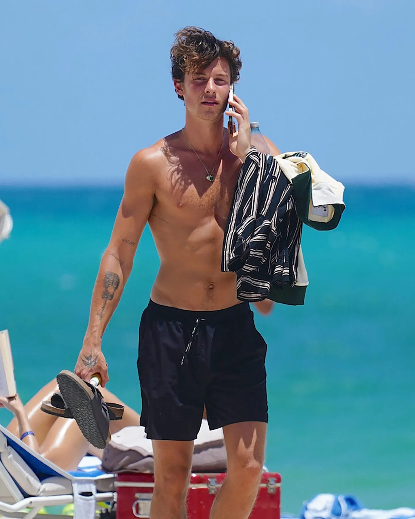 Out of Nowhere: Shawn Mendes Shows Off His Ripped Body — But Fans Can’t Stop Talking About the Mystery Man Beside Him