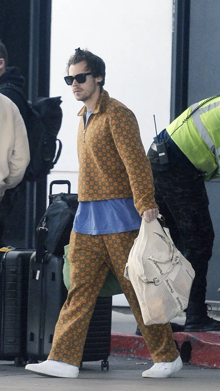 Shining in a Gucci tracksuit in Los Angeles — but Harry Styles’ rare moment of weakness leaves fans wondering what he’s hiding?