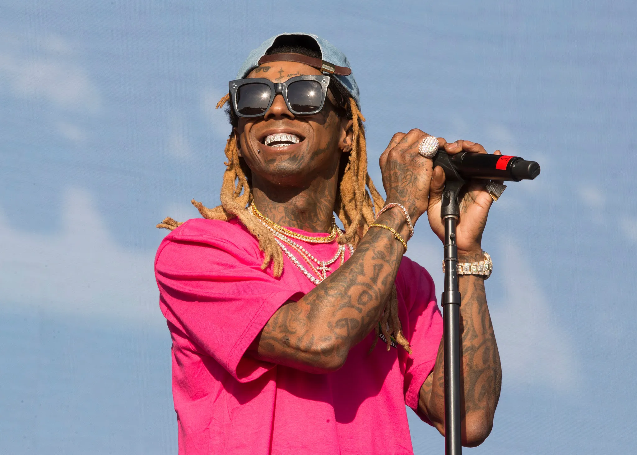 Lil Wayne Gives Cross and Chain to Disabled Fan Who Waited 17 Years to Meet Him