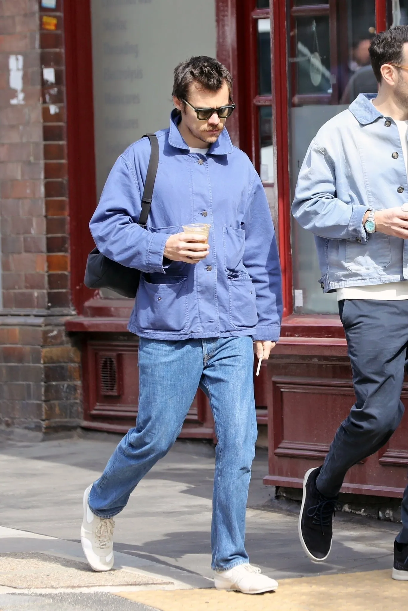 Harry Styles Sparks Dating Frenzy With Mystery ‘Blue Shirt Guy’ — Fans Can’t Believe What They Were Spotted Doing in London