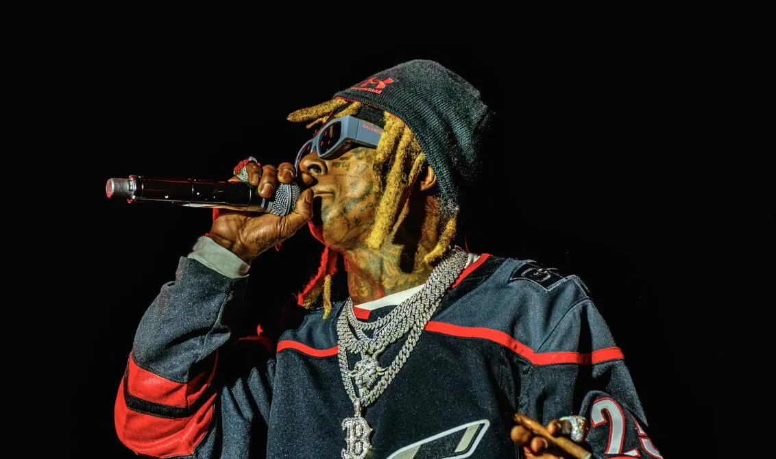 image_68b7e3beed929 Hip-Hop History in the Making: Lil Wayne Brings Out Son Lil Novi for an Unforgettable Carter VI Stage Moment