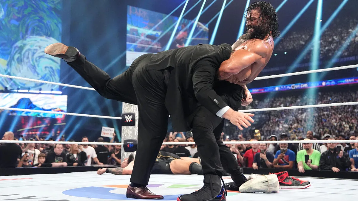 image_68bbc0df146ef Roman Reigns Turns Chaos Into Comedy — Heyman Goes Down Hard After the Tribal Chief Reclaims His Shoes!