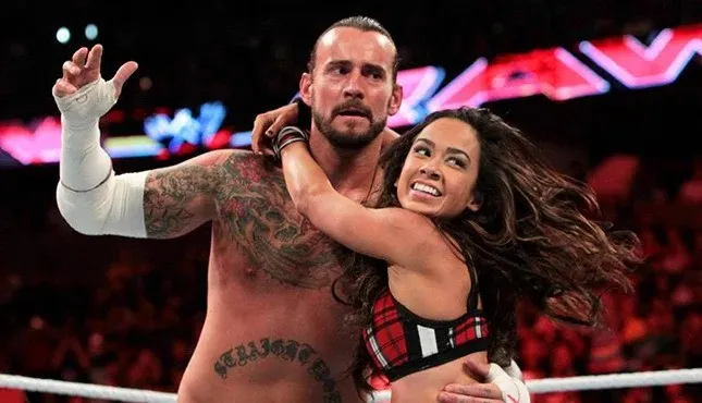 image_68bff10fa8495 CM Punk and AJ Lee vs. Seth Rollins & Becky Lynch — The Match Everyone’s Been Waiting For, But the Tension Is Even Higher Than You Think!