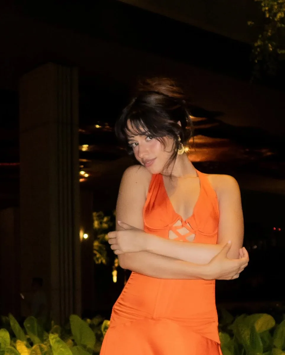 image_68c0ea1f9da93 Camila Cabello Adds Splash of Fun in Vibrant Orange Minidress in Photos