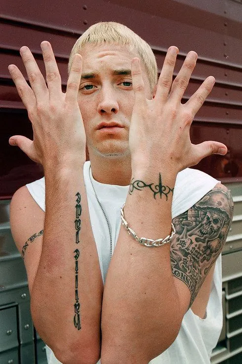 image_68c8e17940a53 "Eminem – Hip-Hop Legend and Comic Book Superfan… But You Won’t Believe the Dark Secret His Venom Tattoo Reveals About His Past!