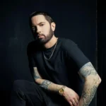 "Eminem – Hip-Hop Legend and Comic Book Superfan… But You Won’t Believe the Dark Secret His Venom Tattoo Reveals About His Past! 1 "Eminem – Hip-Hop Legend and Comic Book Superfan… But You Won’t Believe the Dark Secret His Venom Tattoo Reveals About His Past!