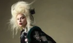 The contradiction in Lady Gaga's personality: both weird and weak, both diva and approachable.