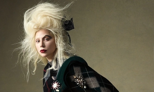The contradiction in Lady Gaga's personality: both weird and weak, both diva and approachable.